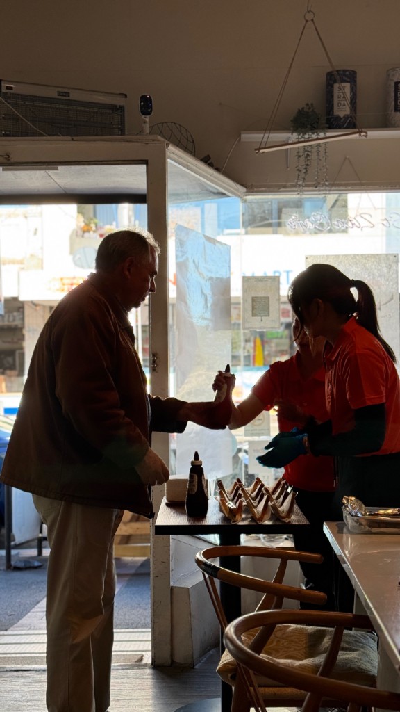 Community lunch service with sausages